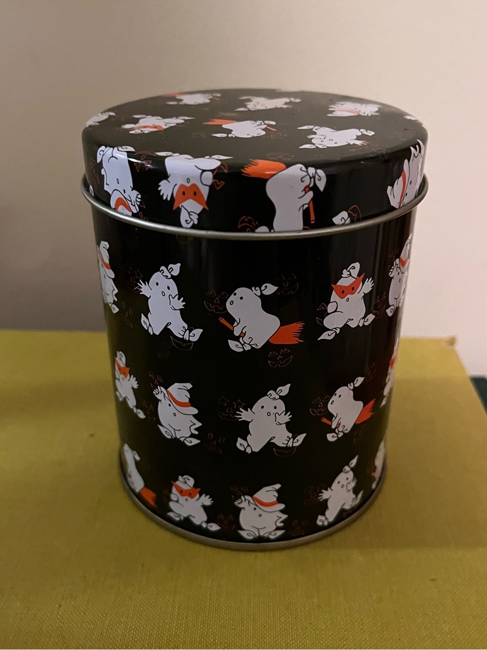 Black Ghost Pattern Tin Canister with Orange Accents